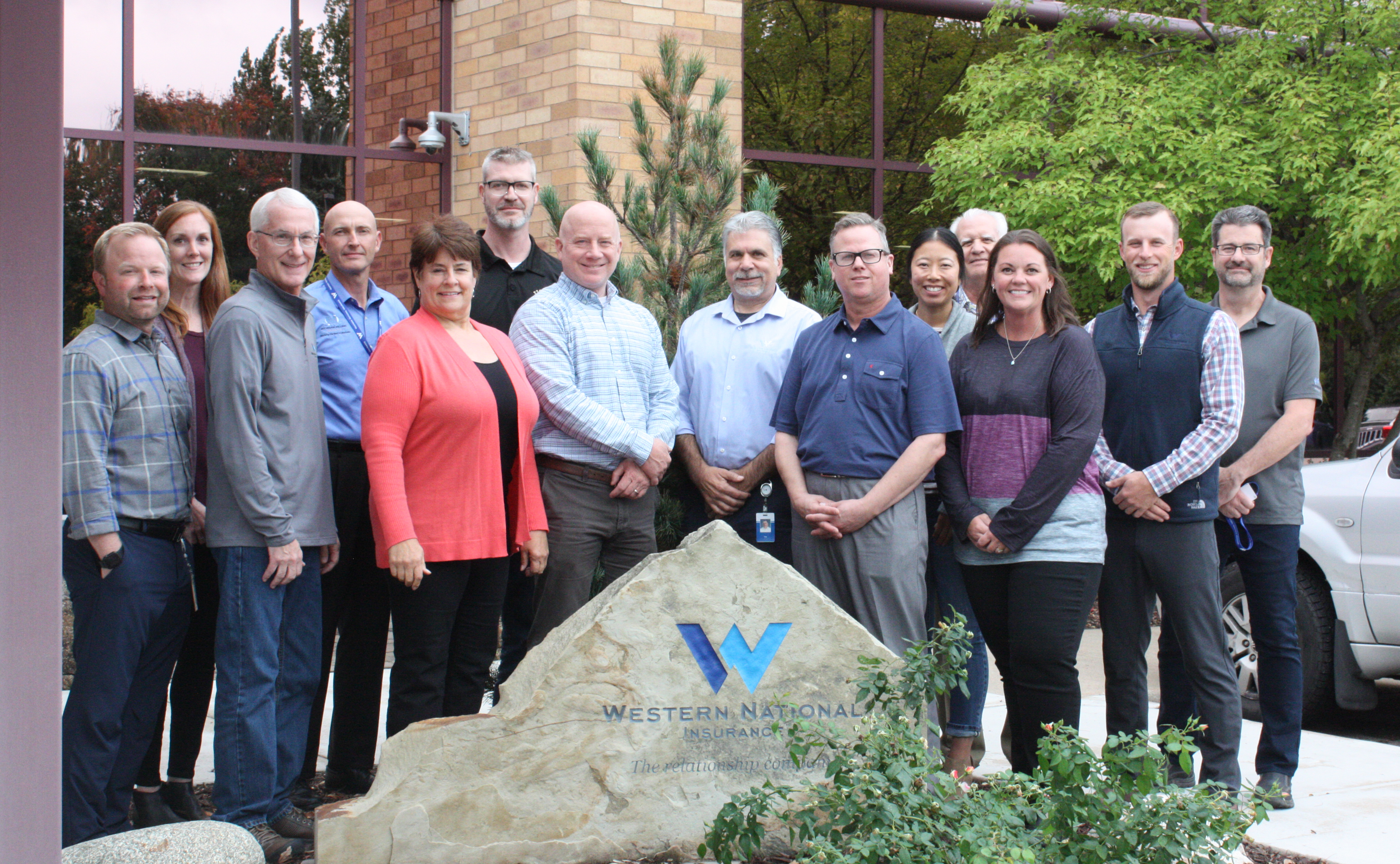 The Western National Insurance Group Loss Control group smiling for a for outside of our Edina, MN office.