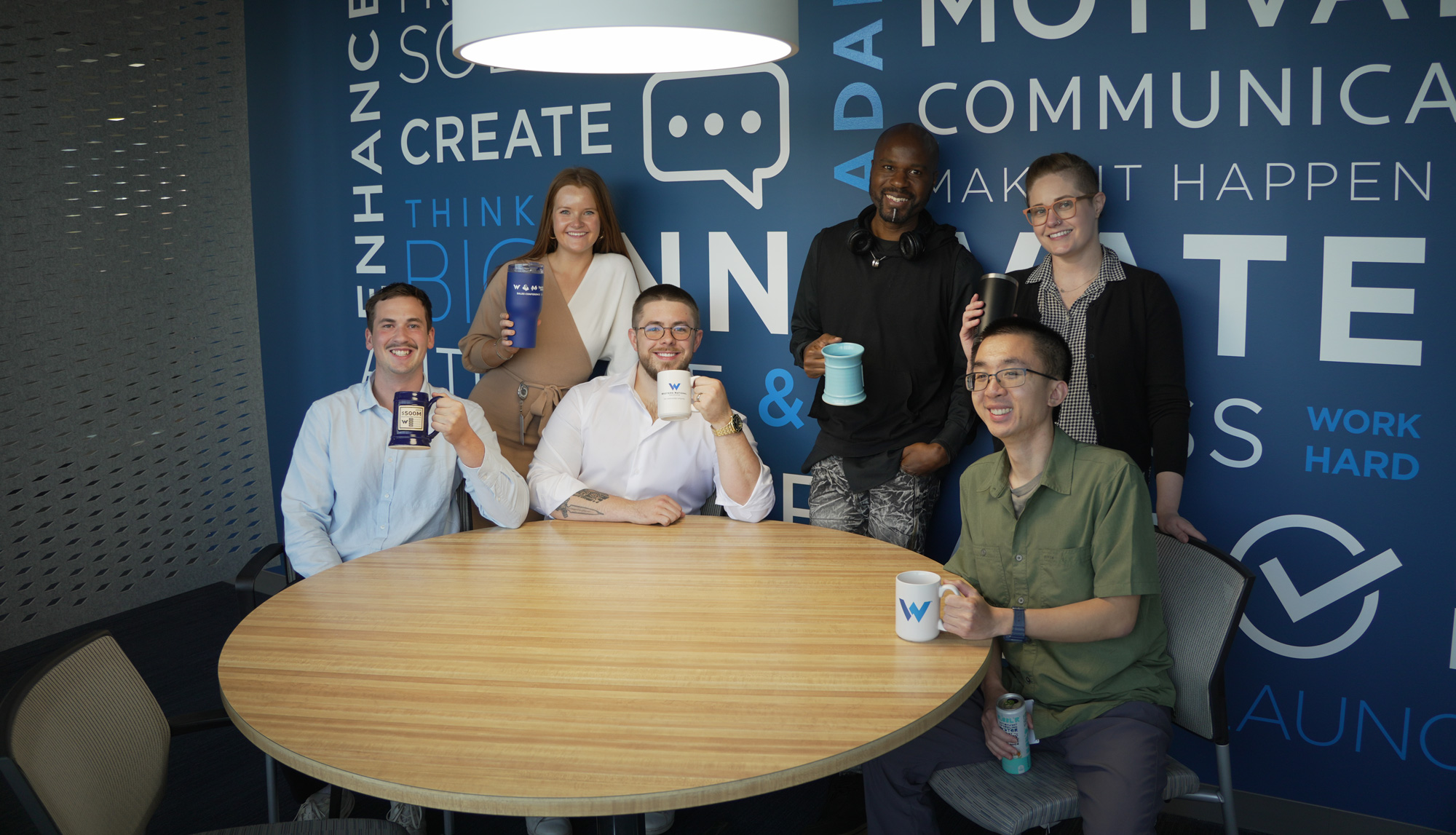A group of interns with Western National's CEO, Rick Long.