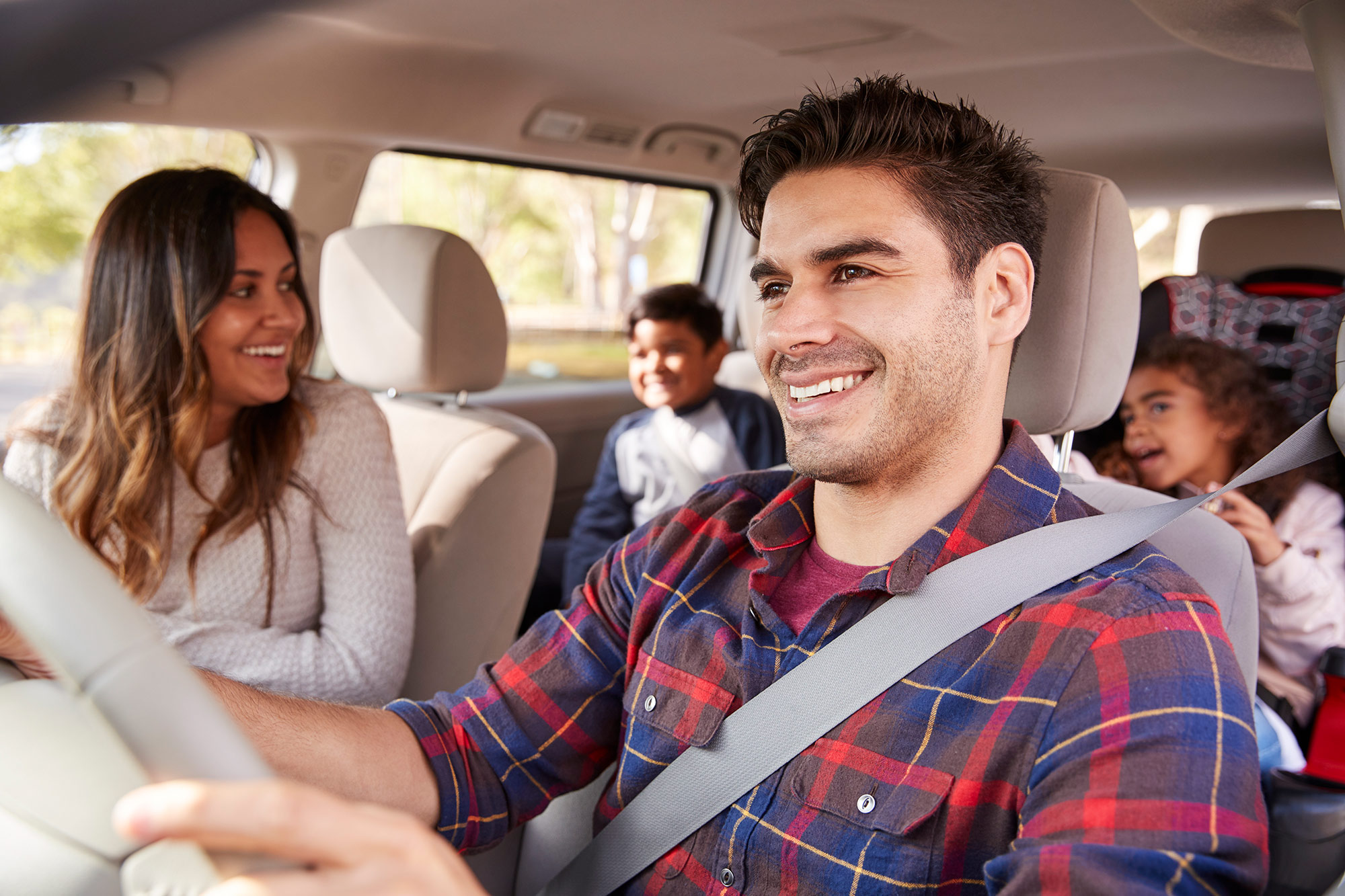 Photo of family in car.