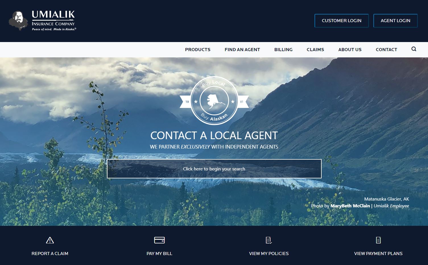 Screenshot of umialik.com homepage with image of Matanuska Glacier in the background. 